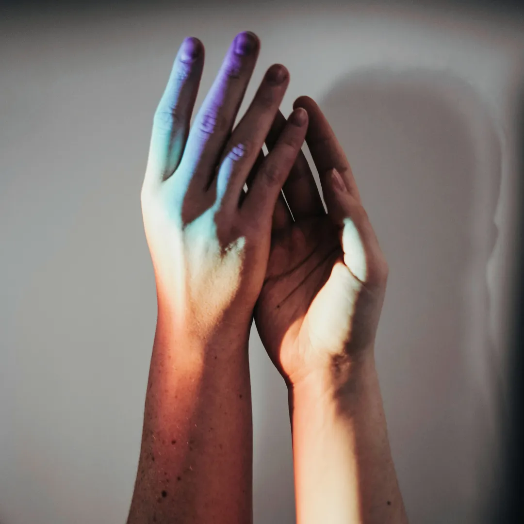 two hands symbolizing connection and memory