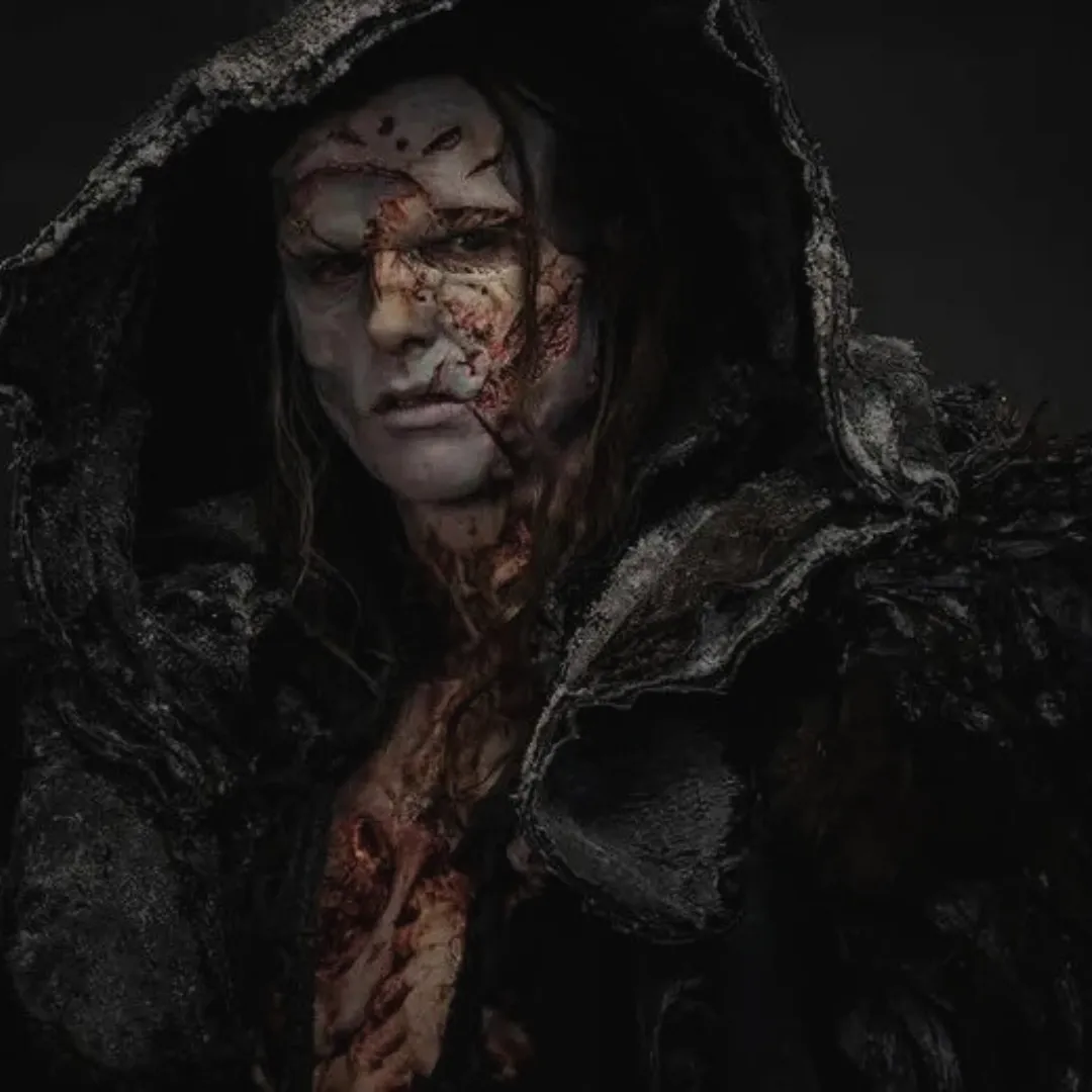 Close-up of the Creature’s face showing sharp features