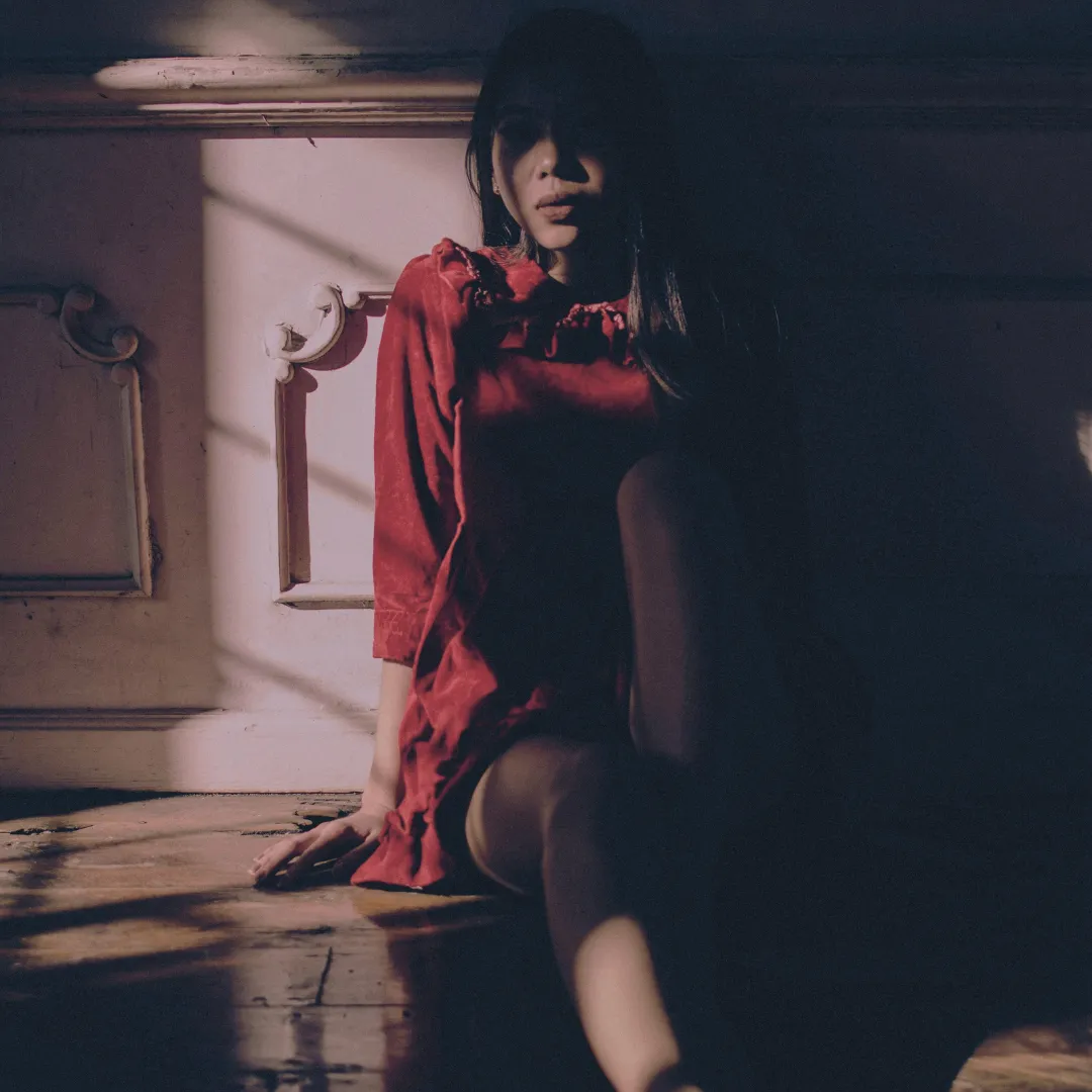 girl sitting on floor