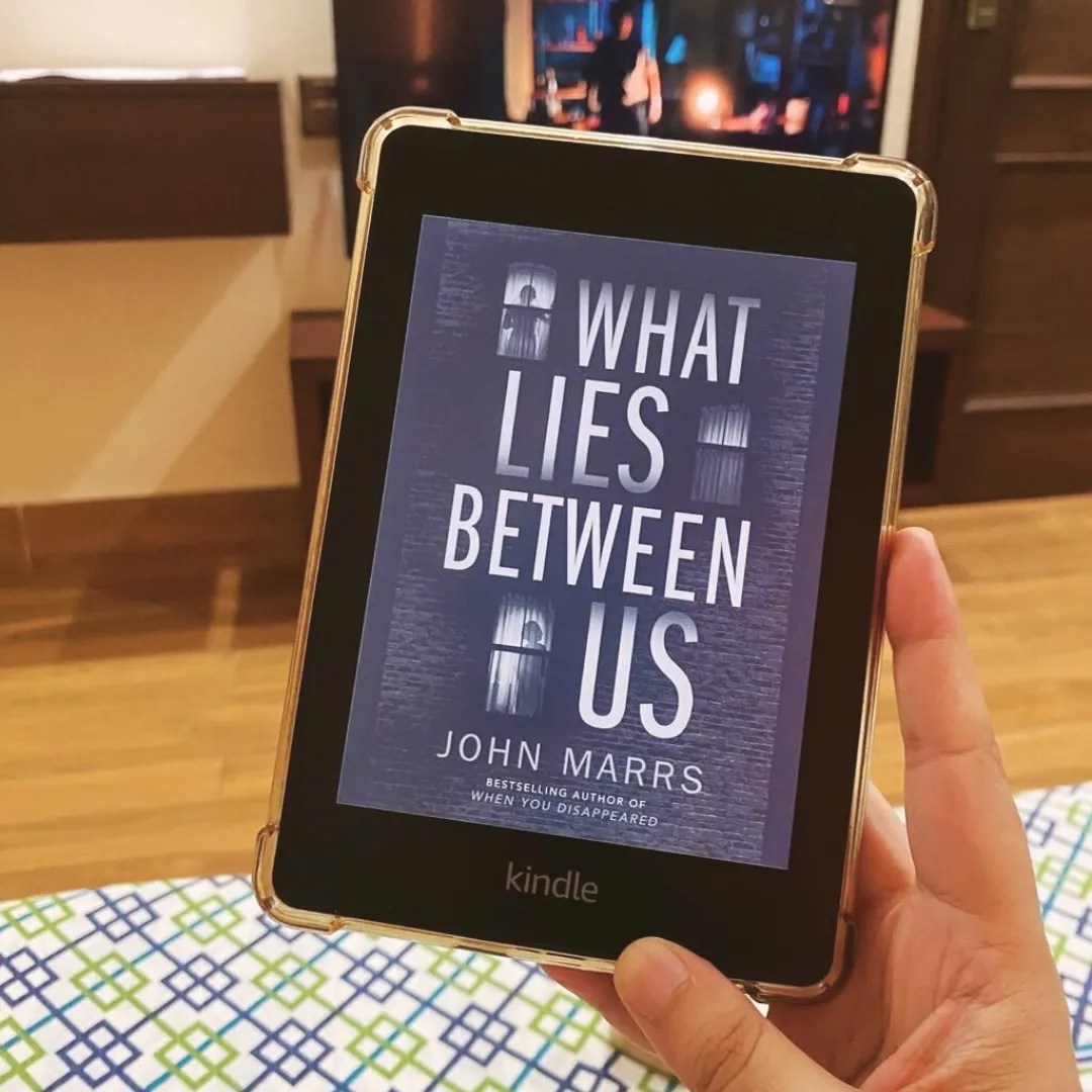 what lies between us by john marrs