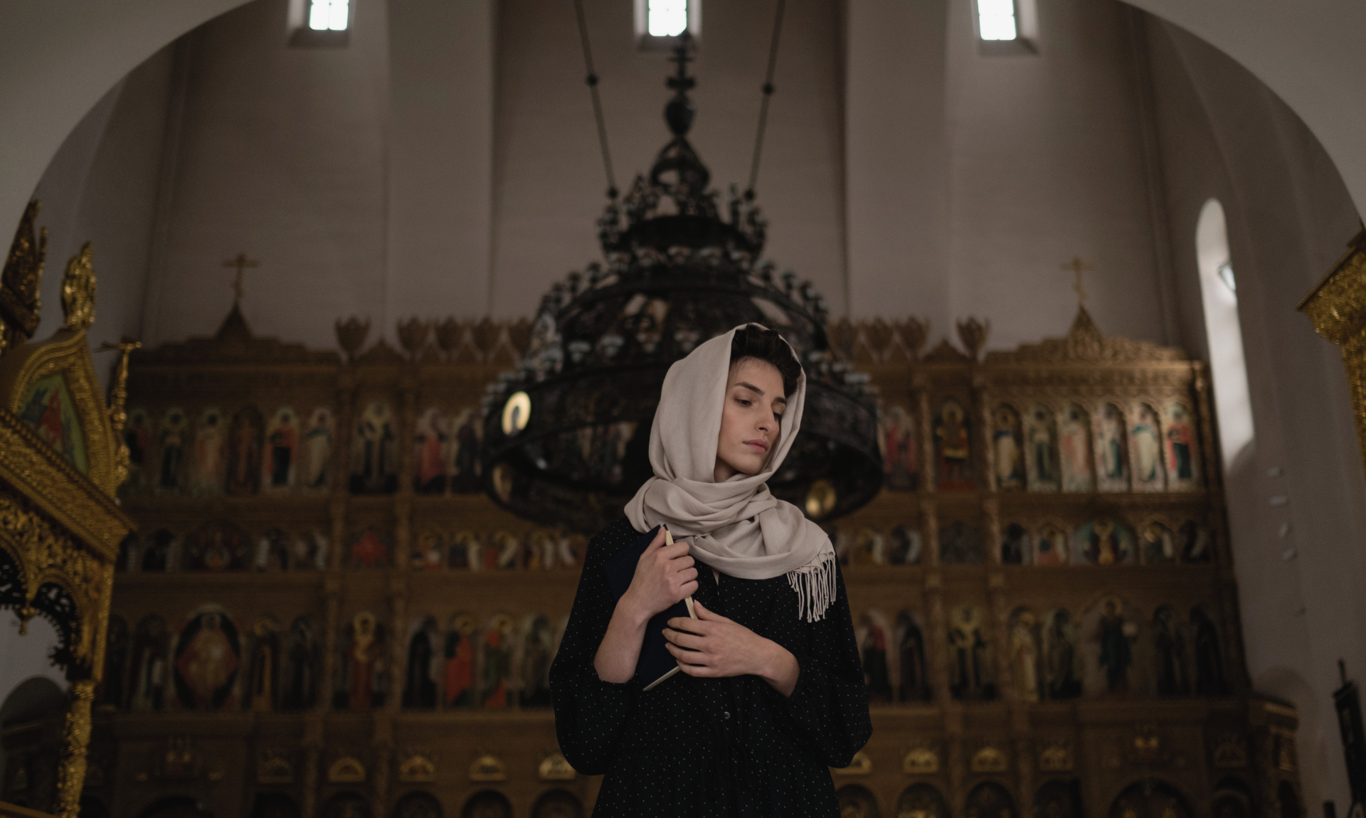 a girl standing in church