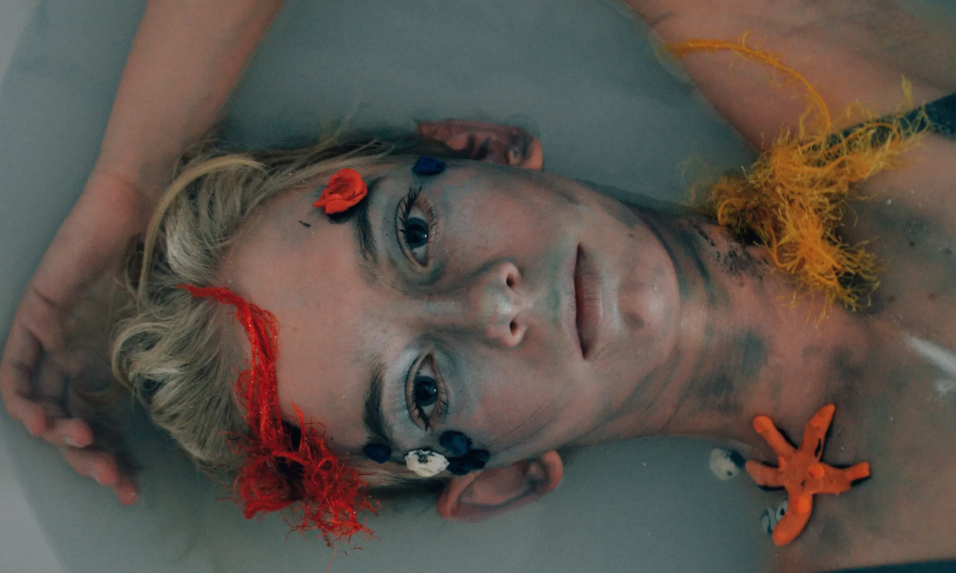 girl-lying-in-bath-tub girl lying in bath tub representing past wounds and trauma